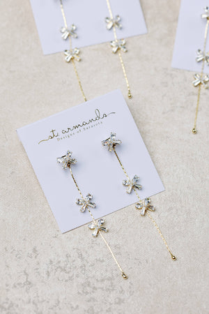 St Armands Designs of Sarasota - Diamond Bow Gold Duster Drop Earrings
