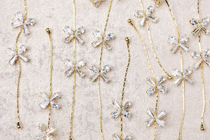 St Armands Designs of Sarasota - Diamond Bow Gold Duster Drop Earrings