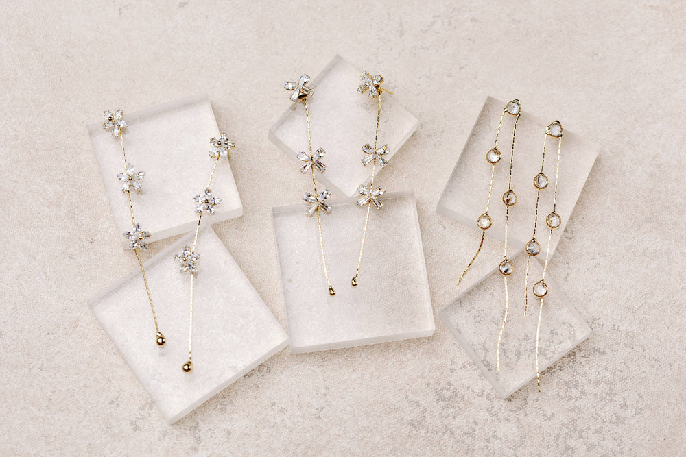 St Armands Designs of Sarasota - Diamond Bow Gold Duster Drop Earrings